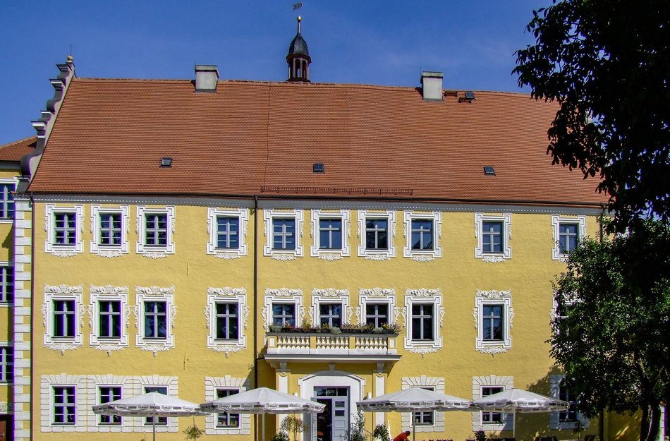 Yellow house with red roof
